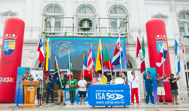 The President of the Chilean Surfing Federation, Juan Agustin Echeverria (far left), amongst the flags of the 13 National Teams, declared the 2014 ISA World Bodyboard Championship officially open. Photo: ISA/Rommel Gonzales