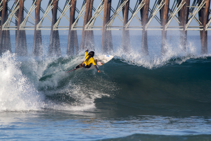 El Salvador’s Katy Diaz smashes the end section of a wave on the south side of Oceanside Pier. Photo: ISA/Chris Grant