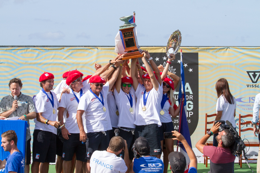 Team France celebrates their first time ever winning the ISA World Junior Team Champion Trophy. Photo: ISA / Miguel Rezendes