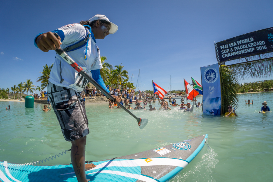 The international SUP community displays their sportsmanship and support, hooting as India’s Tanvi Jagadish crosses the finish line. Photo: ISA / Sean Evans