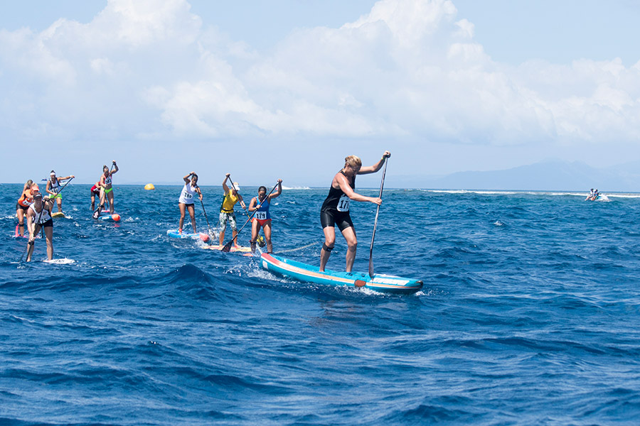 Penelope Armstrong pulls away from the pack during the Women’s SUP Technical Race. Photo: ISA / Sean Evans
