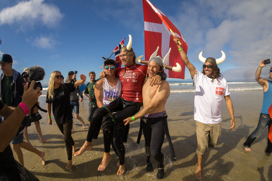 Gold Medalist Bruno Hansen, the sole representative of Denmark, is carried out of the water by Team Norway in a great display of camaraderie between nations. Photo: ISA / Sean Evans