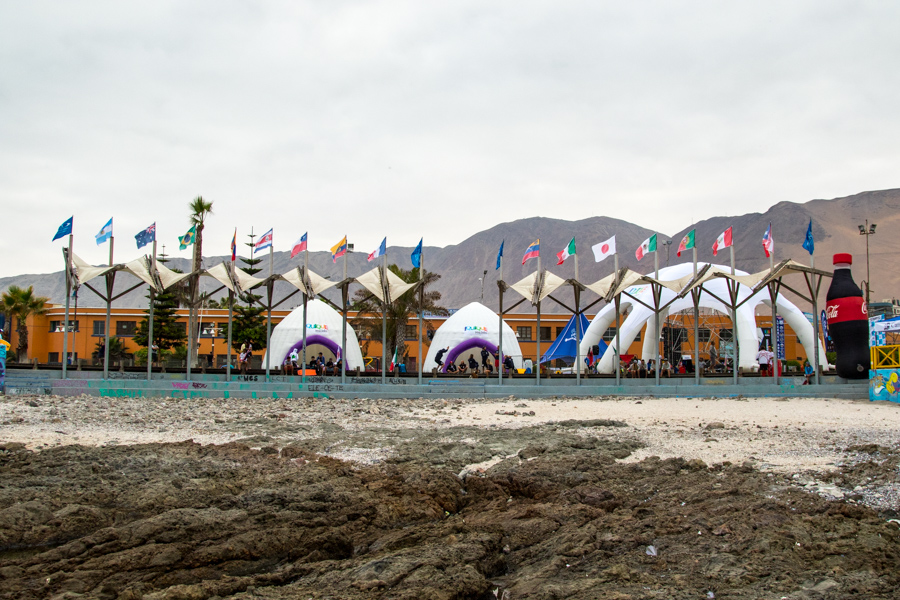 The event site reflects the internationality of the competing nations, as national flags wave in the wind. Photo: ISA/Pablo Jimenez