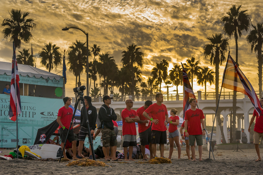 Team Hawaii gathers on the beach in support of their athletes at dawn in Oceanside. Photo: ISA/Sean Evans