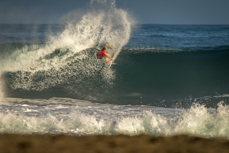 Hawaii’s Kaulana Apo displays his powerful rail surfing en route to advancing to Round 5 of the U-18 Boys. Photo: ISA / Sean Evans