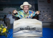 ISA President Fernando Aguerre with the "Sands of the Worlds". PHOTO: ISA / Reed